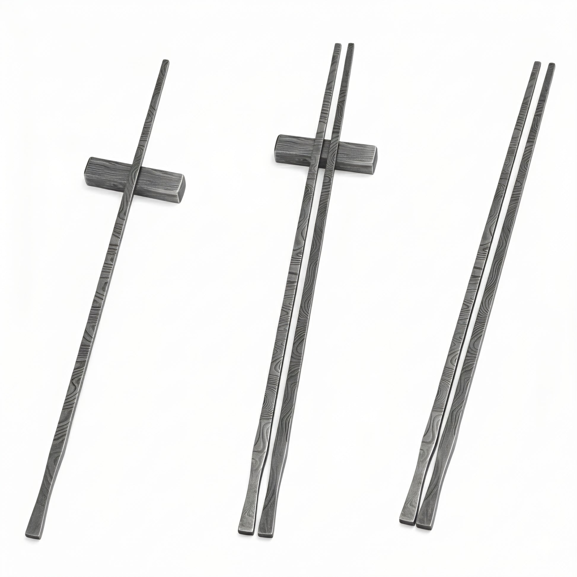 Three pairs of black chopsticks on a white background