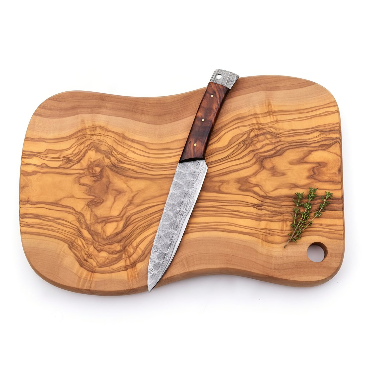 Wooden cutting board with a knife and thyme on a white background