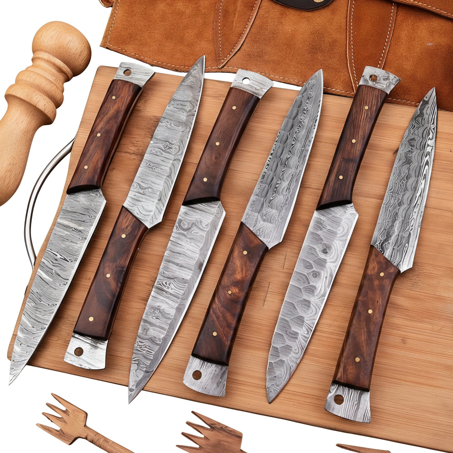 Set of knives with wooden handles on a wooden board