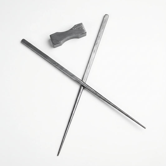 Two metal rods crossed on a white background