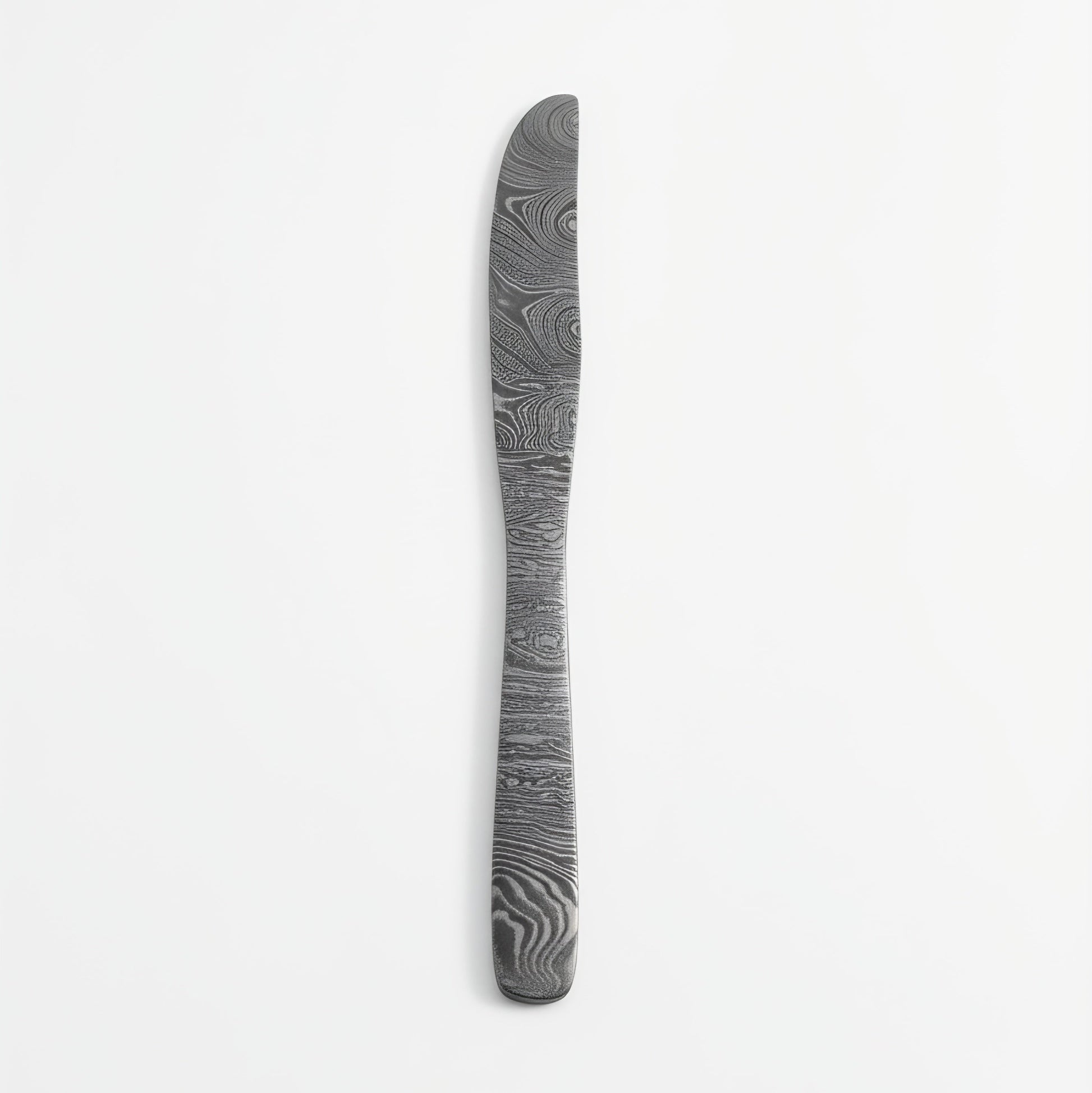 Decorative knife with a patterned handle on a white background Damascus cutlery set