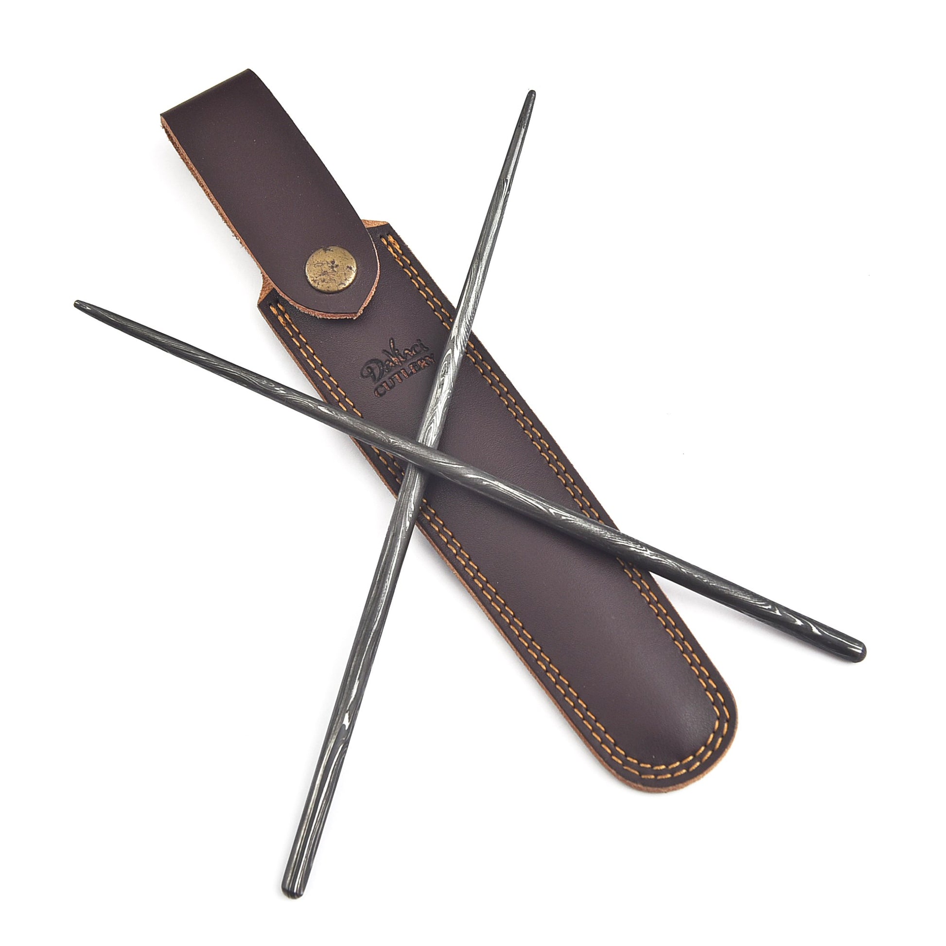 Two metal rods with a brown leather sheath on a white background