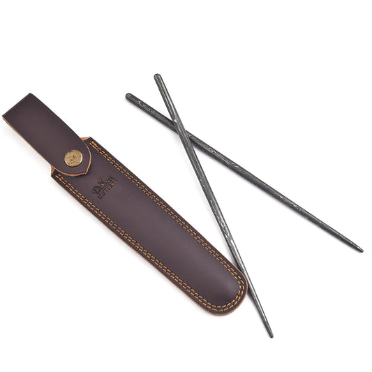 Two metal tools with a brown leather sheath on a white background